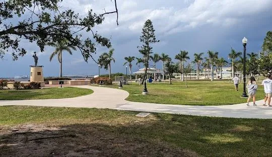 a childrens park with lots of swings and slides