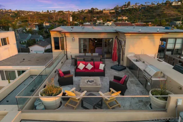 a bathroom with a sink mirror and toilet