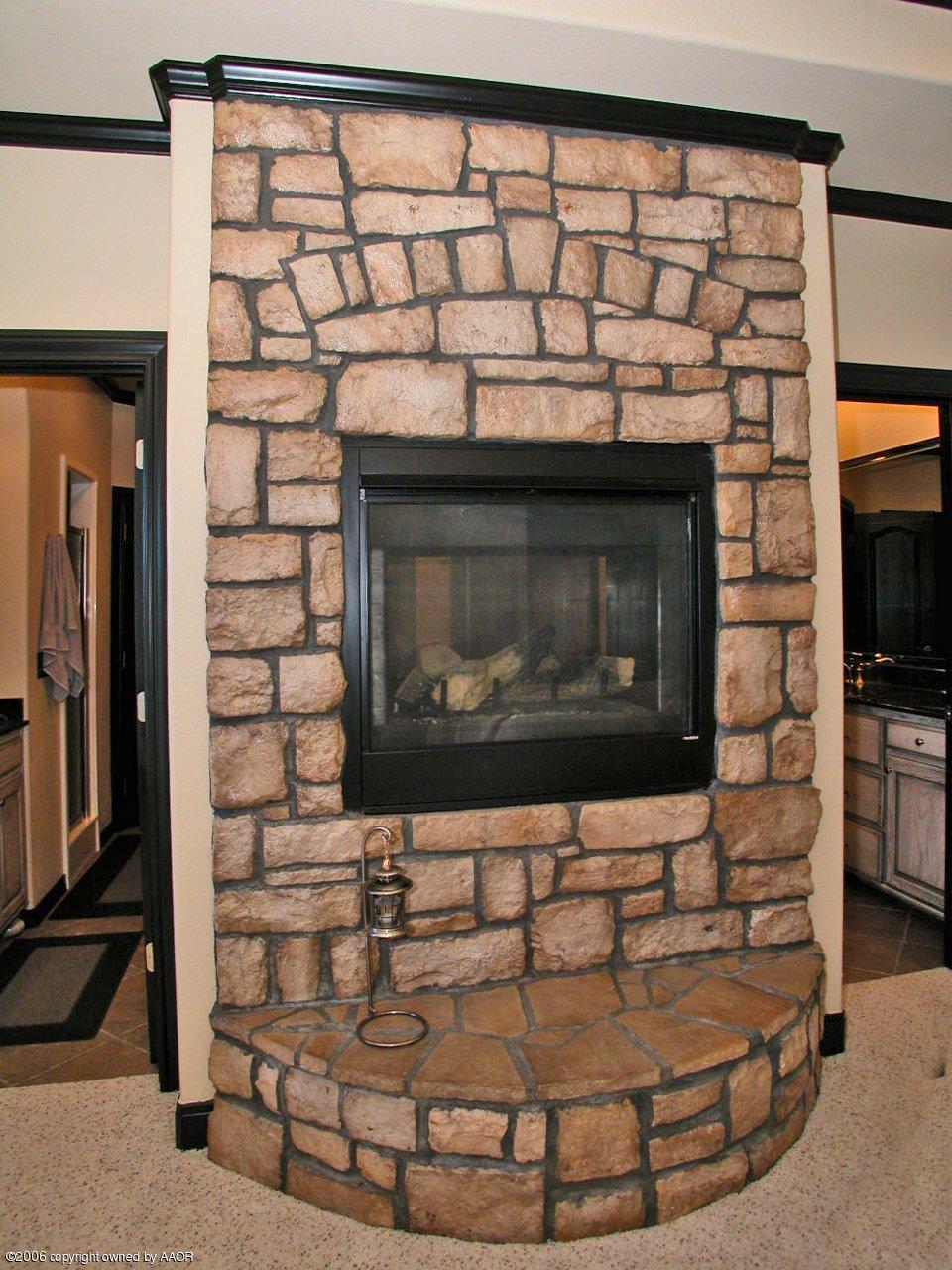 9201 Rj Drive Amarillo, TX 79119 - Photo 5 of 15 Fireplace in Master Bedroom