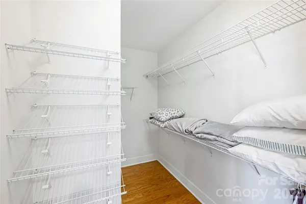 a view of a room with racks on the wall