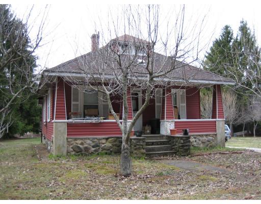 12 Riverside Park Maynard, MA 01754 - Photo 1 of 2 a view of a house with a yard