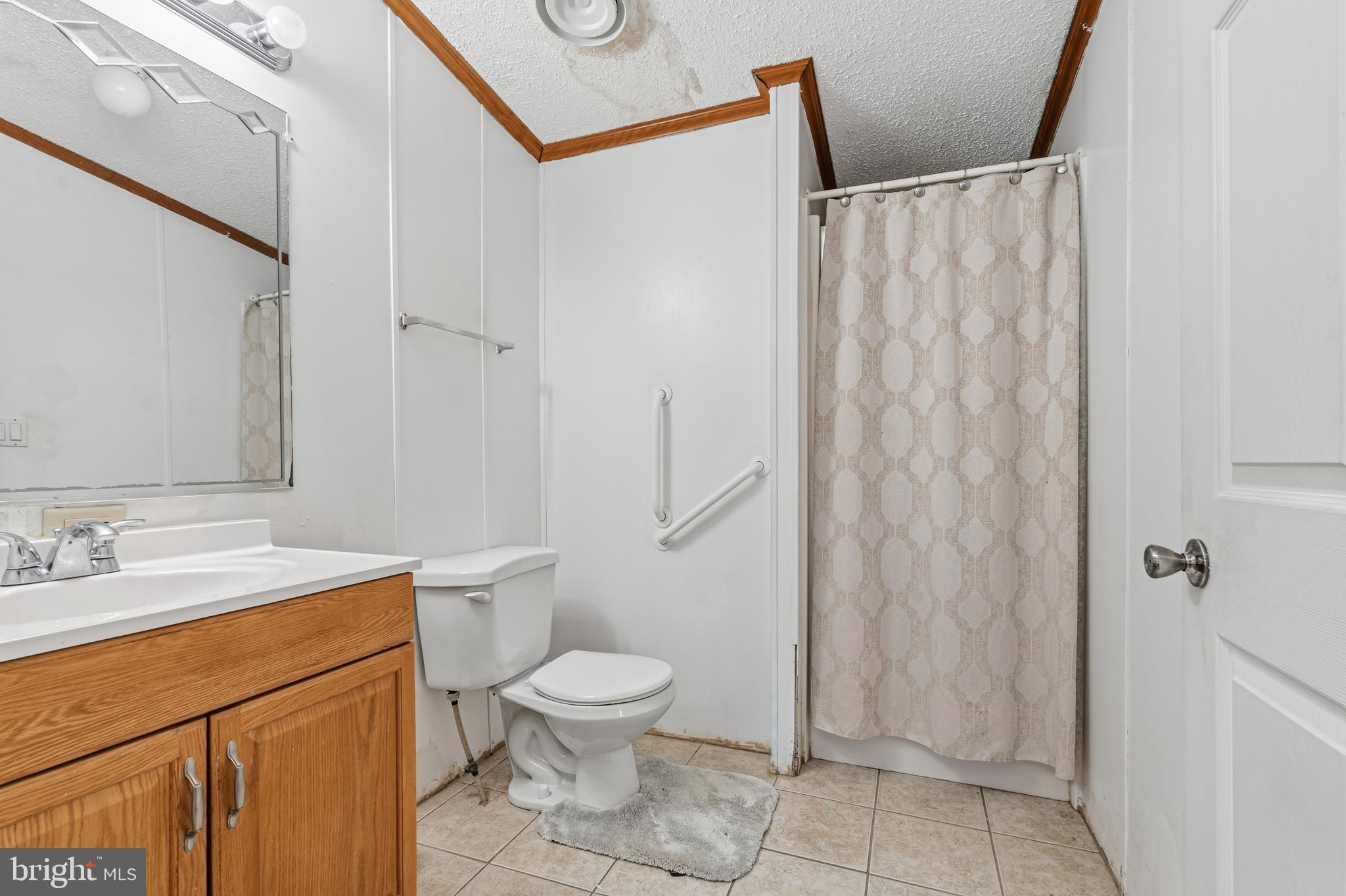 1834 Emily Drive Edgewood, MD 21040 - Photo 10 of 42 a bathroom with a sink a toilet and shower