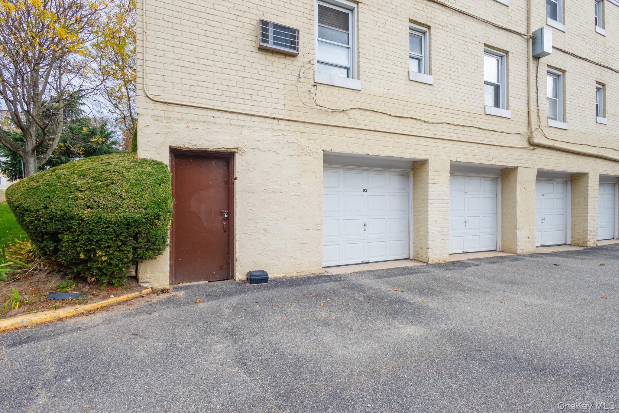 251-41 71st Road, Unit 54B Queens, NY 11426 - Photo 19 of 20 a view of an house with backyard