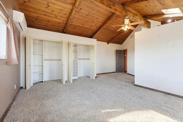 a view of a livingroom with white walls