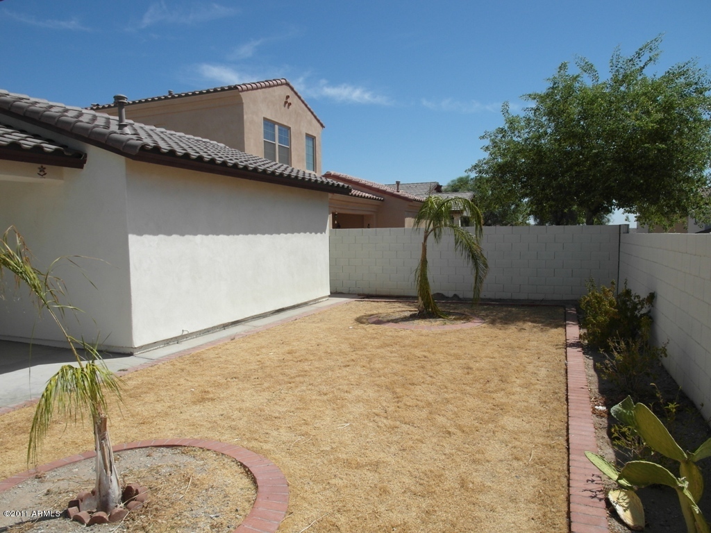 20779 West Ridge Road Buckeye, AZ 85396 - Photo 18 of 23 a house view with a outdoor space