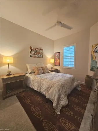 a view of a room with a table and chairs