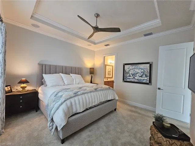 a spacious bathroom with a double vanity sink mirror and shower