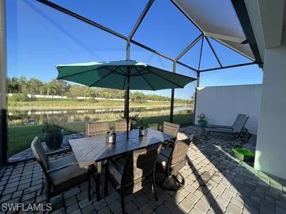 a outdoor space with patio the couches and a umbrella