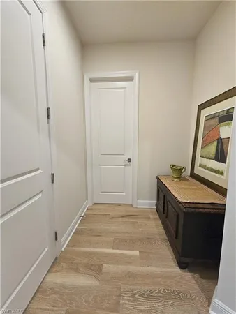 a room with a stove and a cabinet