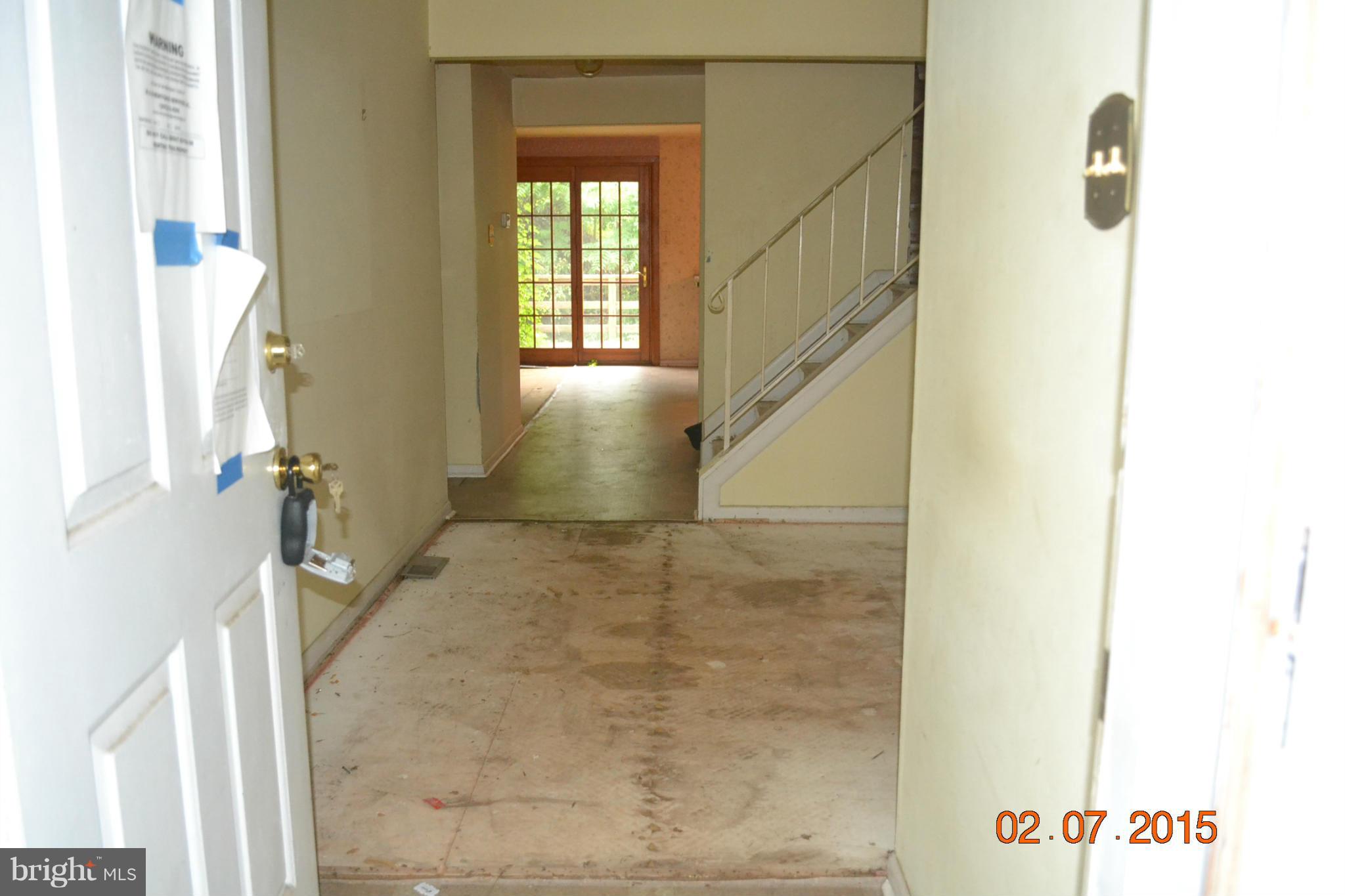 4804 Galley Road Baltimore, MD 21236 - Photo 3 of 7 Foyer to family room & deck