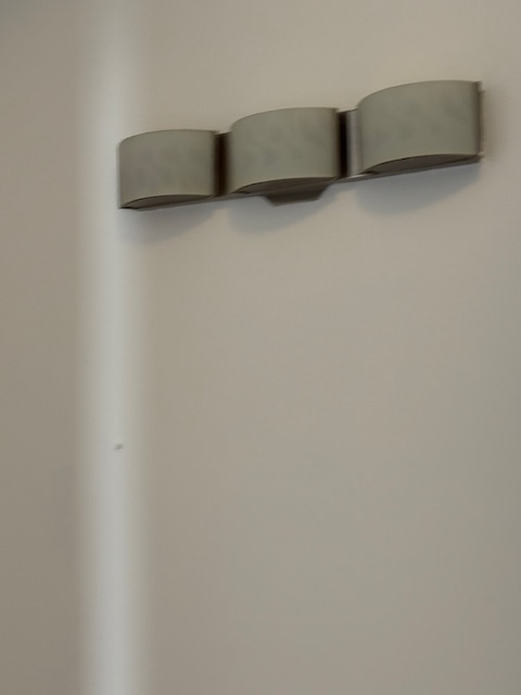 1500 East 73rd Street, Unit 3 Chicago, IL 60619 - Photo 12 of 13 a kitchen with a white wall and a large window