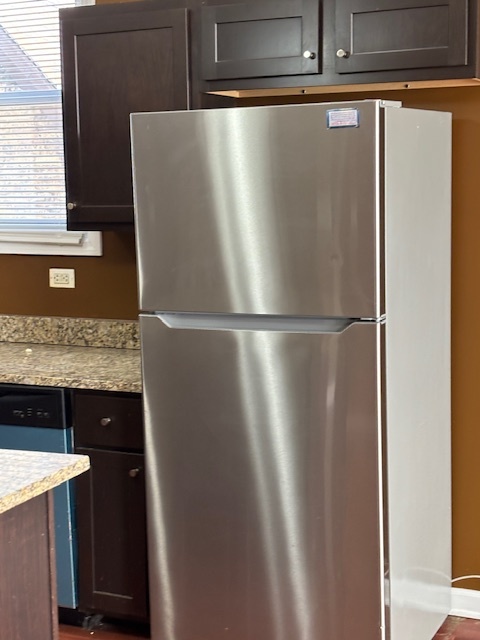 1500 East 73rd Street, Unit 3 Chicago, IL 60619 - Photo 8 of 13 a view of a refrigerator in kitchen