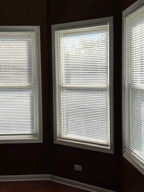 1500 East 73rd Street, Unit 3 Chicago, IL 60619 - Photo 9 of 13 a view of an empty room with a window