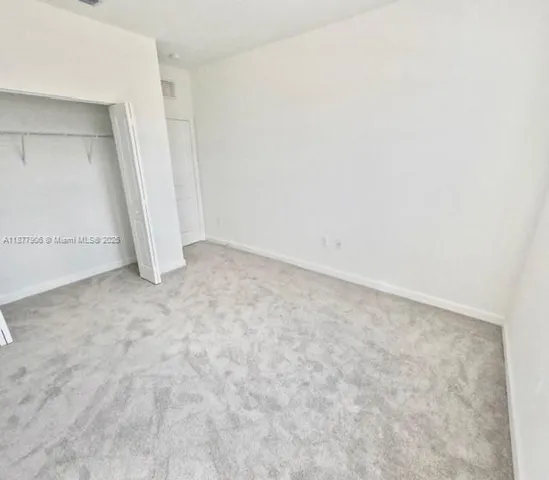 an empty room with an empty room