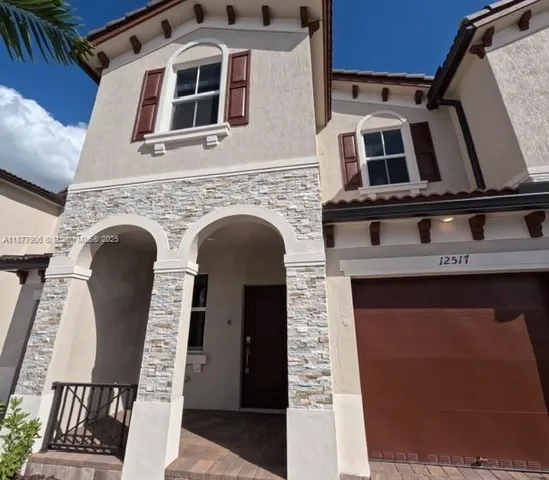 a front view of a house with windows