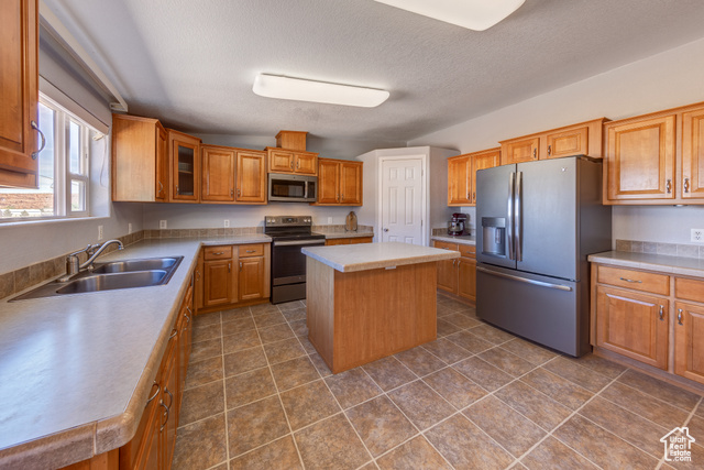 33 Merriam Court Moab, UT 84532 - Photo 11 of 56 Upstairs kitchen with tons of cabinets and slate appliances