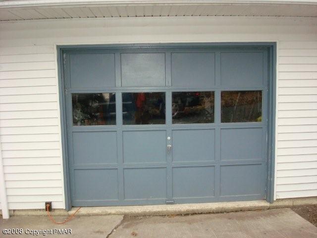 1113 Fern Road Pocono Summit, PA 18346 - Photo 7 of 9 Attached Garage