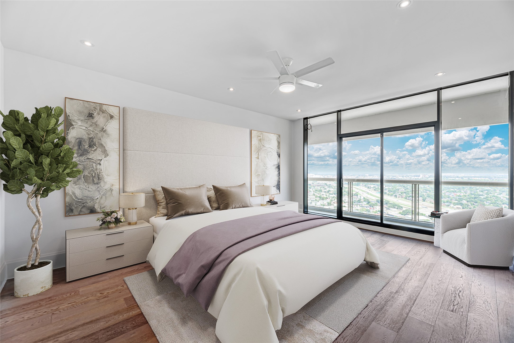 1701 Hermann Drive, Unit 34L Houston, TX 77004 - Photo 11 of 37 The graceful primary bedroom lies at the end of the corridor outfitted with its own private balcony with a wall of glass affording spectacular views when you wake. Virtually staged photo.