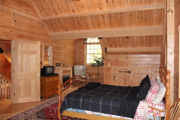 386 Piper Road Ashby, MA 01431 - Photo 16 of 24 a bedroom with furniture and a window