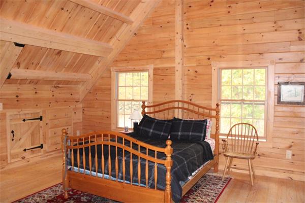 386 Piper Road Ashby, MA 01431 - Photo 17 of 24 a bedroom with furniture and a window