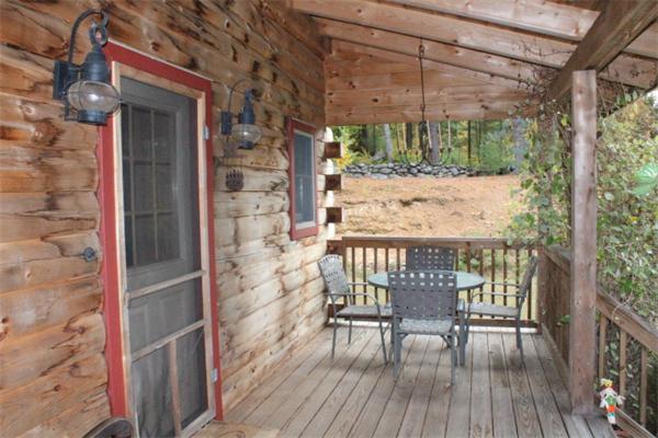 386 Piper Road Ashby, MA 01431 - Photo 19 of 24 a view of a balcony with chairs
