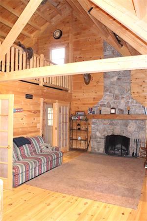 386 Piper Road Ashby, MA 01431 - Photo 3 of 24 a view of a terrace with a fireplace