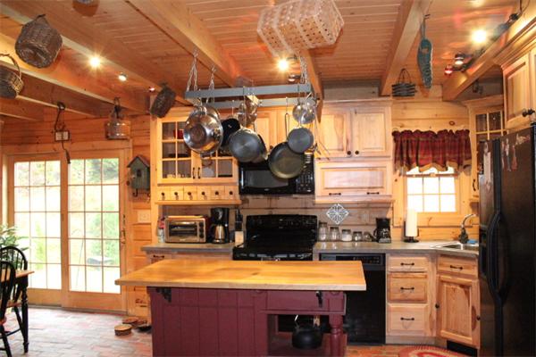 386 Piper Road Ashby, MA 01431 - Photo 8 of 24 a kitchen with stainless steel appliances granite countertop a stove and a refrigerator