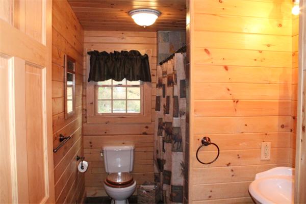 386 Piper Road Ashby, MA 01431 - Photo 9 of 24 a bathroom with a toilet and a shower