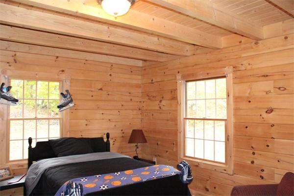 386 Piper Road Ashby, MA 01431 - Photo 10 of 24 a bedroom with a bed and a window