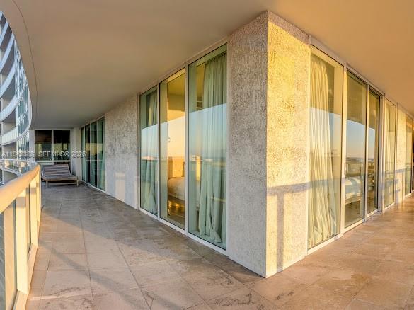 450 Alton Road, Unit 1202 Miami Beach, FL 33139 - Photo 14 of 68 a view of a big room with windows and furniture