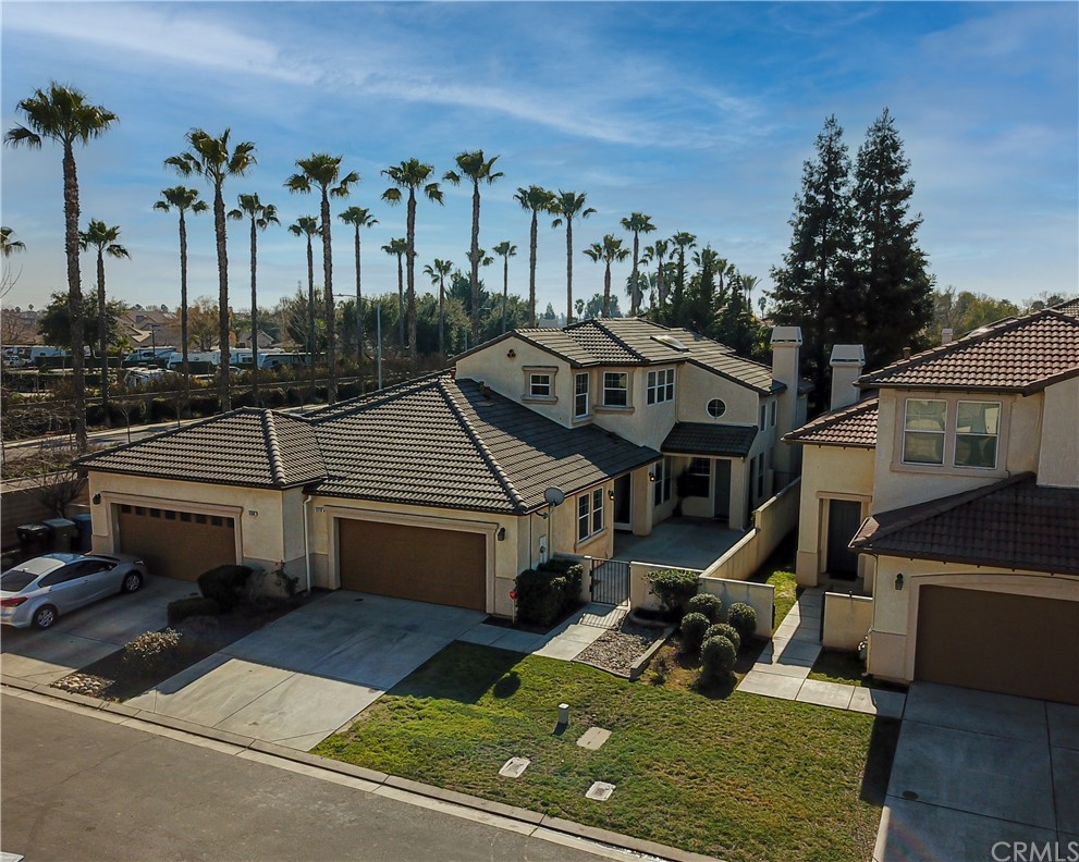 a aerial view of a house with a yard