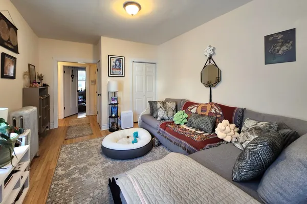 a living room with furniture and a table