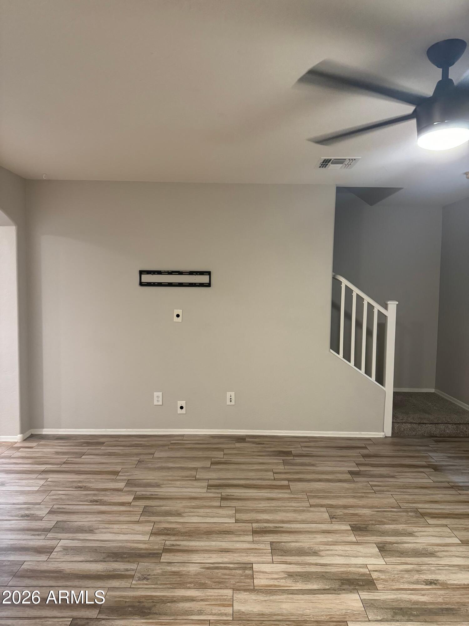 2491 East Boston Street Gilbert, AZ 85295 - Photo 14 of 22 a view of a room with wooden floor