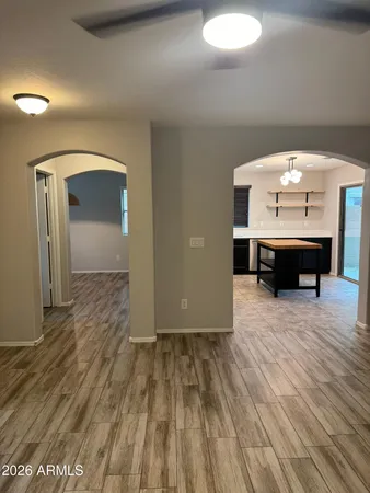 a view of a livingroom with wooden floor