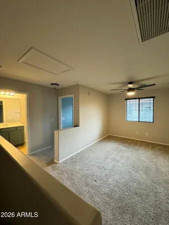 a view of an empty room with window