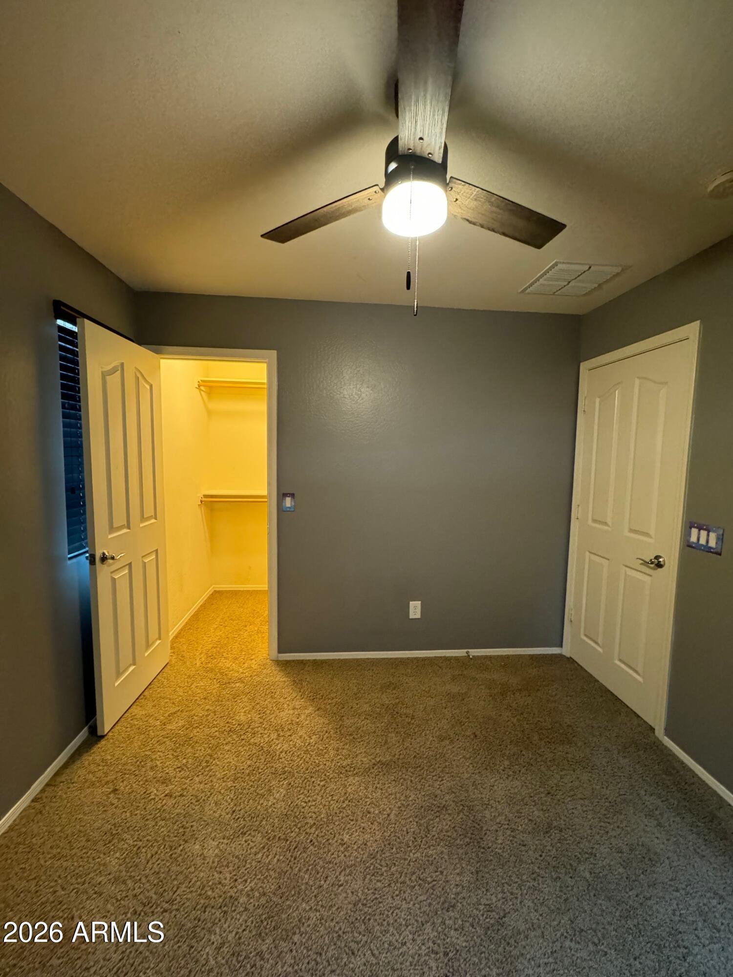 2491 East Boston Street Gilbert, AZ 85295 - Photo 7 of 22 an empty room with a empty space and windows