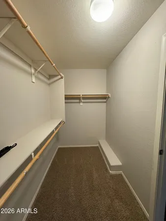 a view of a room with racks on the wall