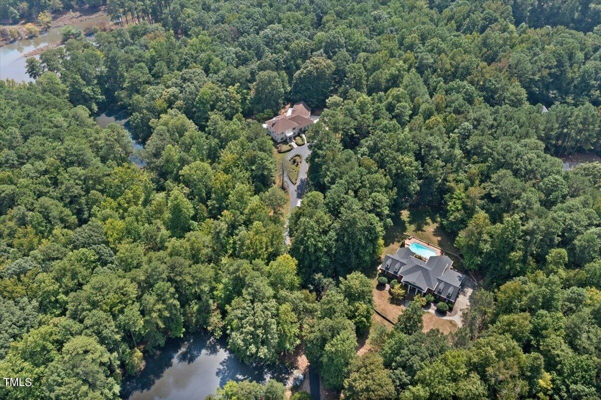 6300 Swallow Cove Lane Raleigh, NC 27614 - Photo 67 of 67 an aerial view of a house with a yard and outdoor seating