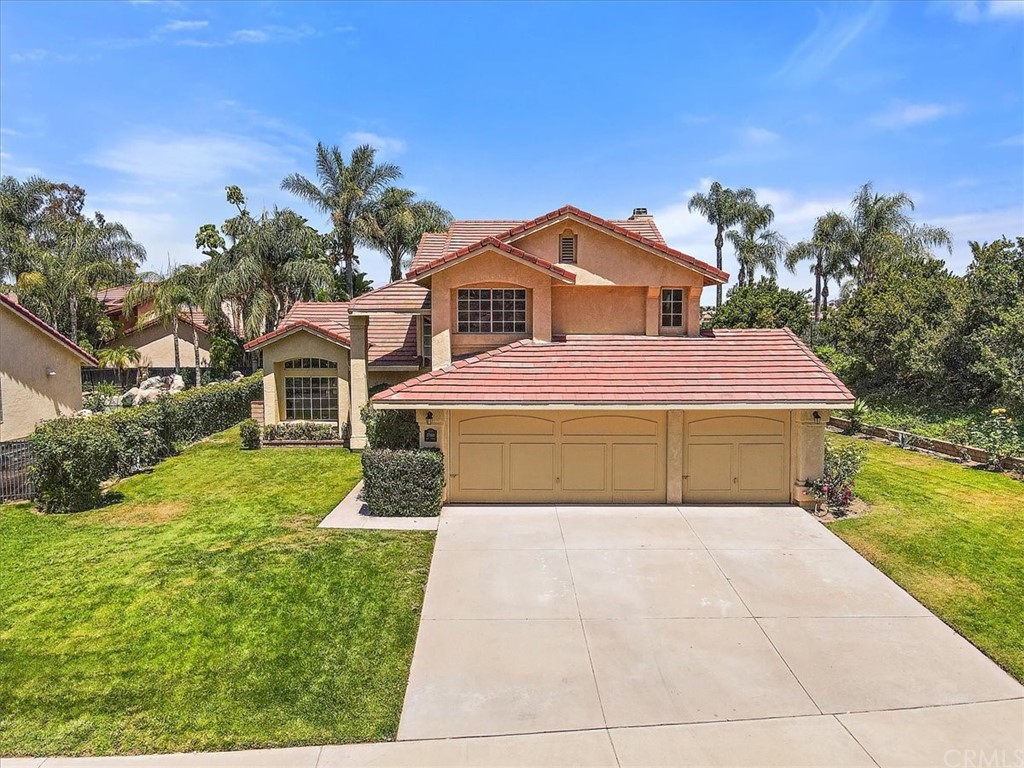 17160 Lakepointe Drive Riverside, CA 92503 - Photo 1 of 1 a front view of a house with a yard