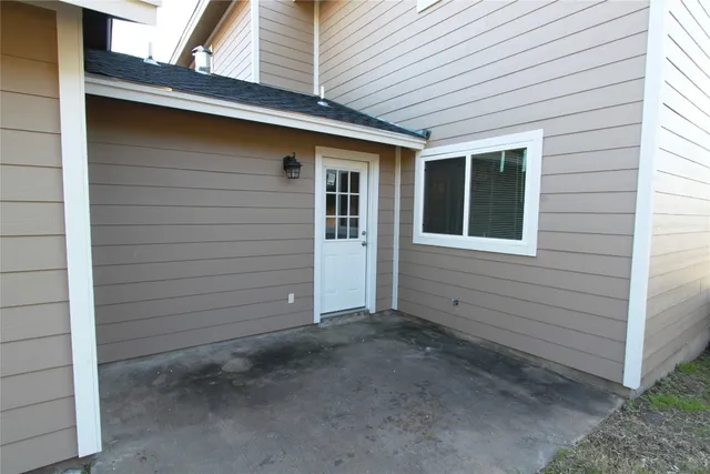 a view of front door and garage