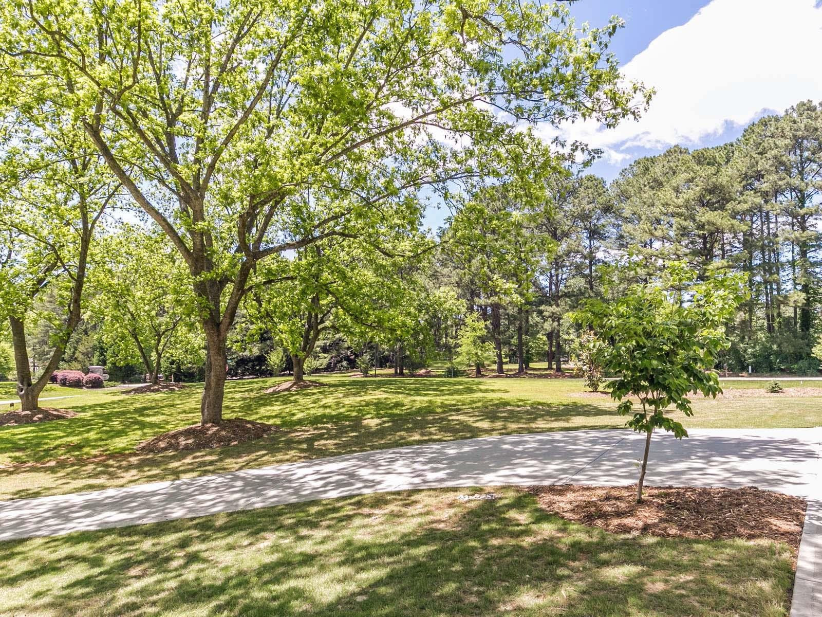 1408 Shady Pecan Place Raleigh, NC 27613 - Photo 3 of 38 Beautiful Pecan Tree - Extra Wide Driveway