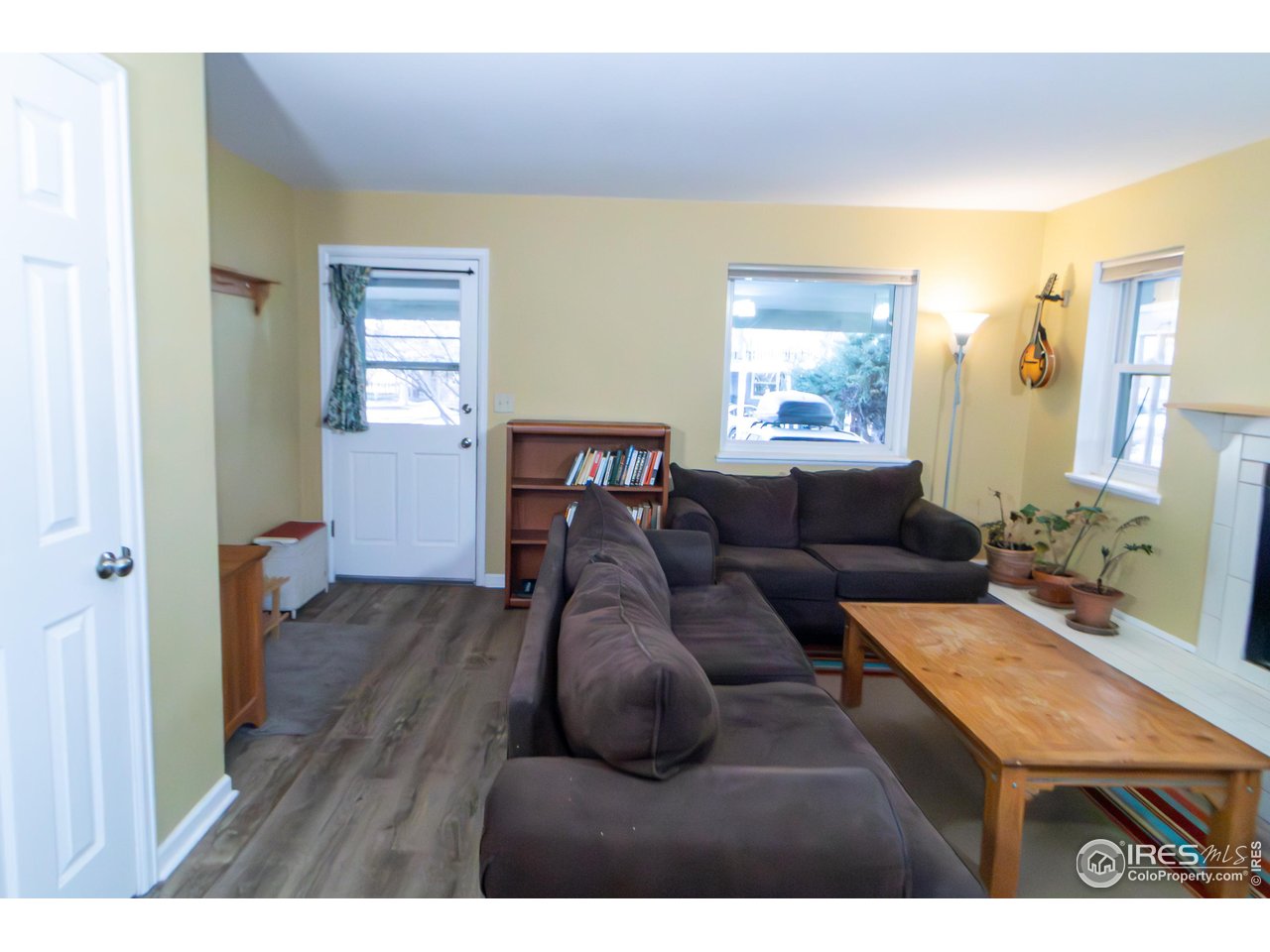 4651 Portside Way Boulder, CO 80301 - Photo 5 of 19 a living room with furniture and a wooden floor