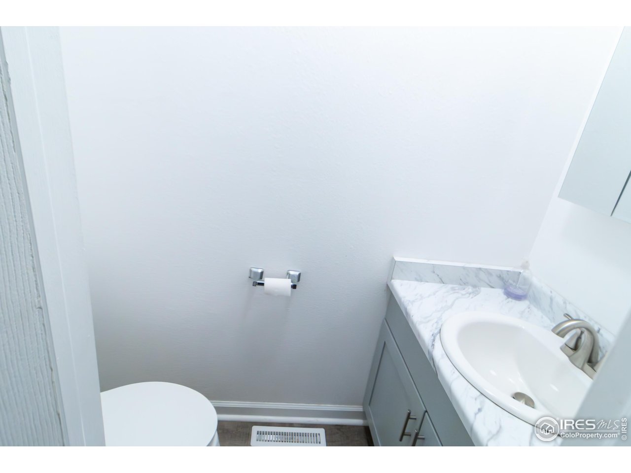 4651 Portside Way Boulder, CO 80301 - Photo 6 of 19 a bathroom with a sink and a toilet