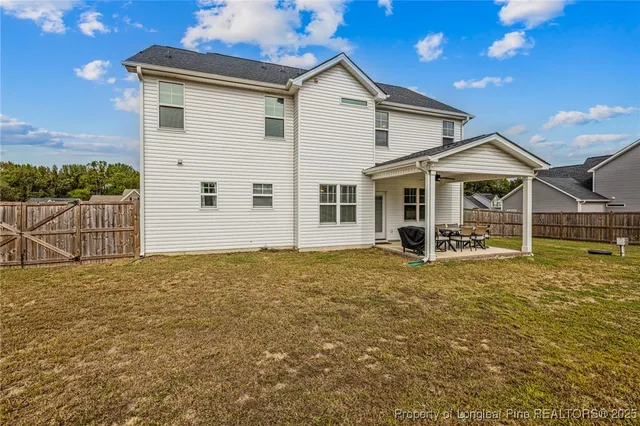 a view of an ocean & house