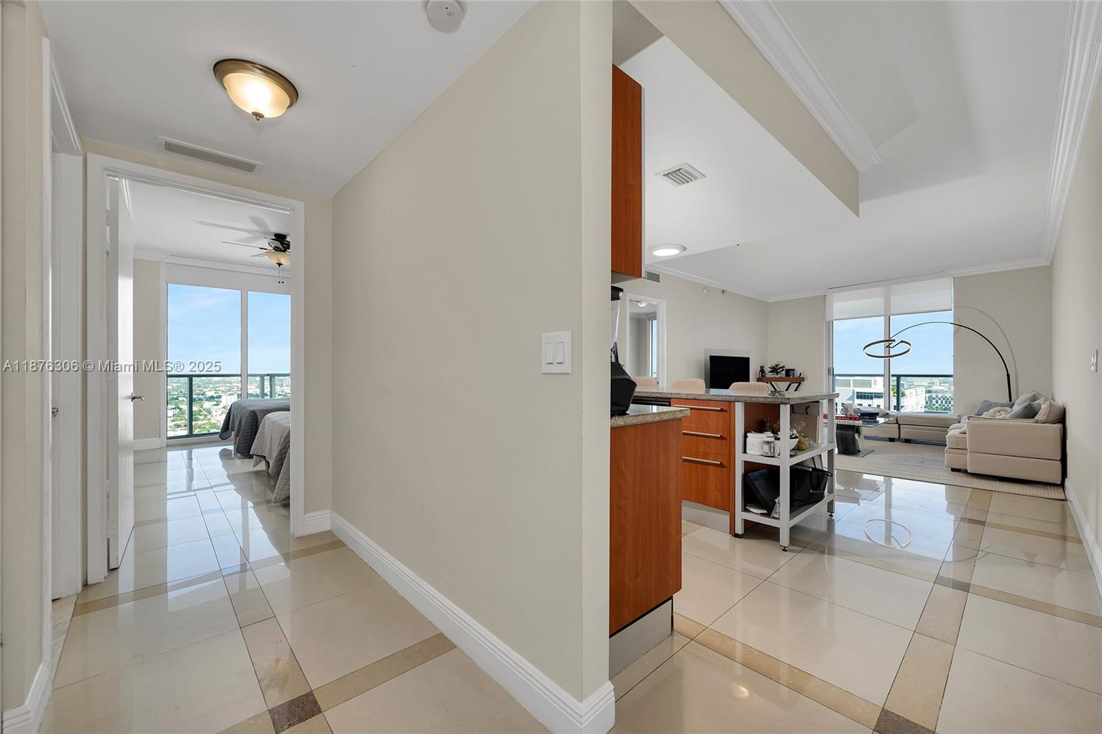 185 Southwest 7th Street, Unit 4201 Miami, FL 33130 - Photo 19 of 29 a view of living room kitchen with furniture and a window