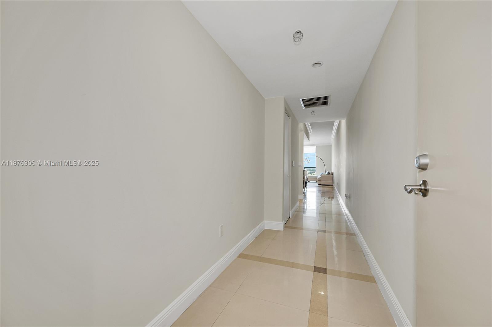 185 Southwest 7th Street, Unit 4201 Miami, FL 33130 - Photo 24 of 29 a view of a hallway with a white walls