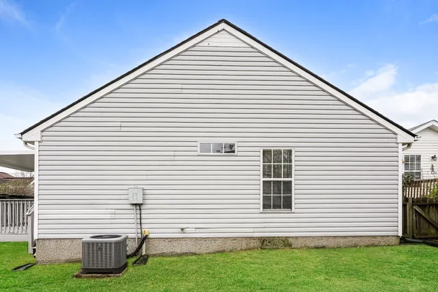 a view of a white house with a white door