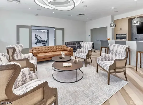 a living room with furniture and a table