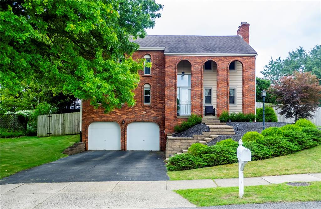 102 Bertley Ridge Drive Coraopolis, PA 15108 - Photo 1 of 25 a view of a house with a yard