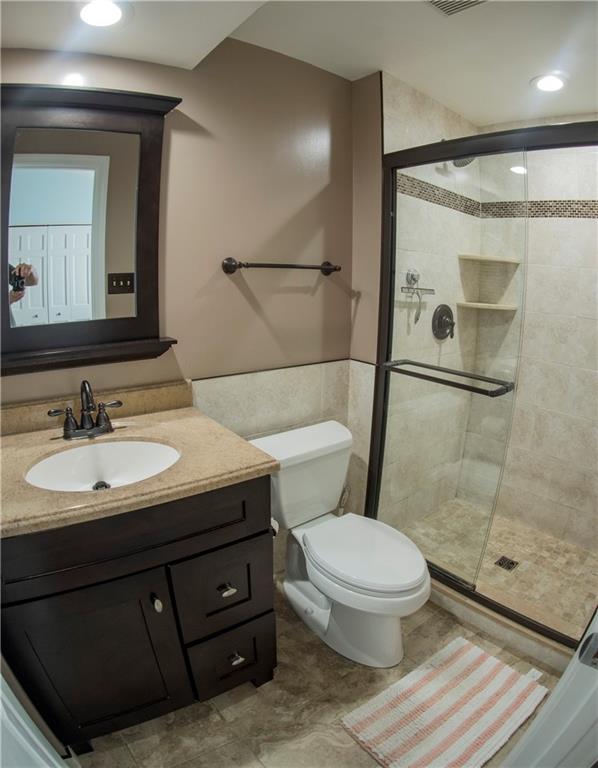 102 Bertley Ridge Drive Coraopolis, PA 15108 - Photo 13 of 25 a bathroom with a sink and a mirror